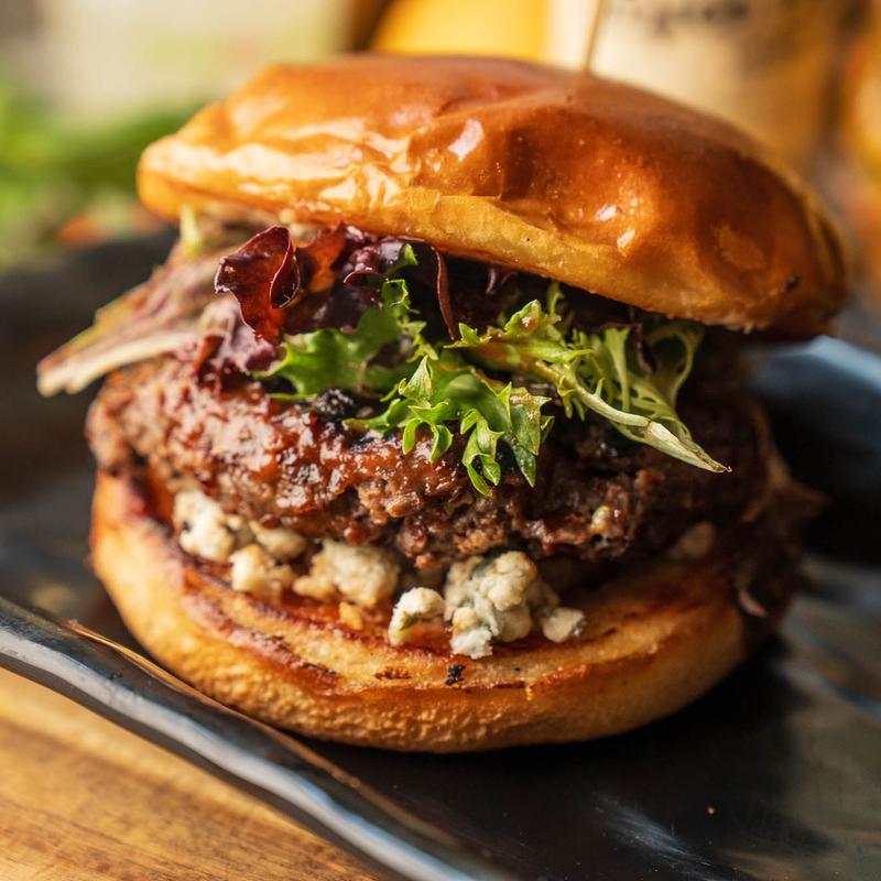 Bacon BBQ Burger with blue cheese on a brioche bun